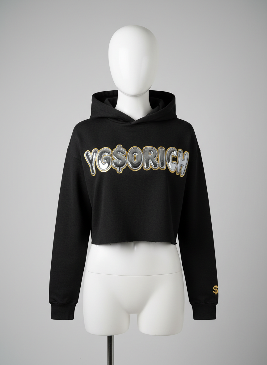 Black cropped women's hoodie with chrome bubble YG$ORICH letters outlined in gold