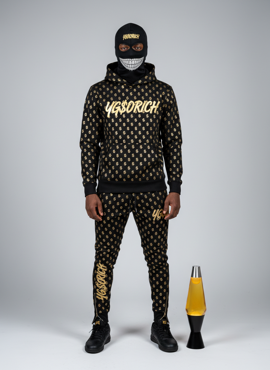 Full-body lookbook shot of the complete black and gold monogram outfit with mask and lava lamp