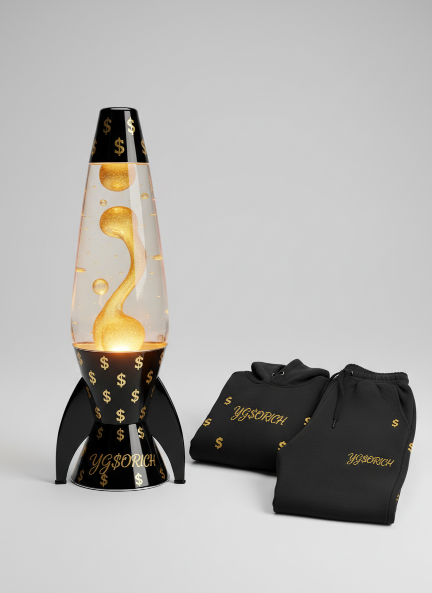 Black and gold rocket lava lamp with glowing gold lava and YG$ORICH on the base